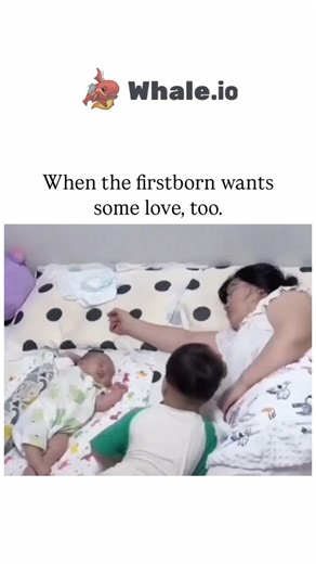 UNIVERSAL KNOWLEDGE on Instagram: "The Instagram reel showcases a 24-second video of a young boy gently nudging his newborn sibling aside to cuddle his mother on a polka-dot bed, capturing a tender moment of firstborn affection-seeking, which has resonated widely for its relatable family humour. , an account curating internet curiosities, the clip amassed 35,000 likes and 1.3 million views in under three months, prompting over 100 replies featuring comparable sibling videos that amplify themes o