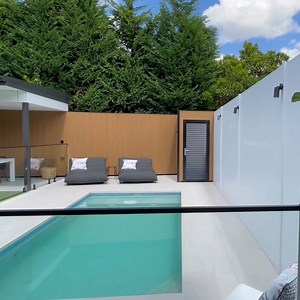 Check out the stunning SlimWall! It perfectly complements the modern aesthetic of this stylish backyard. Who wouldn't want to relax and unwind in this beautiful space?  SlimWall installation: stylefencing #modularwalls #makeitmodular #slimwall #fence #fencedesign #modernfence #boundaryfence #privacyfence #acousticfence | ModularWalls | Facebook