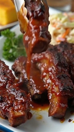 Slow Cooker BBQ Ribs.#SlowCookerRecipes #BBQRibs #CrockpotMeals #ComfortFood