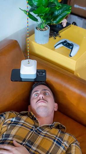 Unnecessary Inventions on Instagram: "iDangle™️ the first electronic way to watch your favorite programs completely hands free while laying down. Next time you go to relax, simply flip the switch downward to begin repelling our phone mount toward you. Stop it at just the right location magnetically attach your phone and get comfortableNext effortlessly enjoy your go to content with absolute levitating ease. Then simply grab your phone and send the holster back to the ceiling to go about your day
