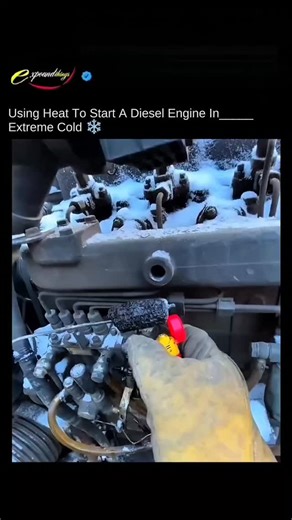 ex pounds on Instagram: "In the unforgiving stillness of extreme cold, even the toughest machines can fall silent. This diesel engine sat frozen and unresponsive, its fuel thickened, its metal chilled to the core. But out here, where winter pushes everything to its limits, experience matters more than fancy tools. Watch as a seasoned mechanic uses an old-school trick to bring the engine back to life: gently warming the air intake with a small ignited torch. With patience, steady hands, and a bit