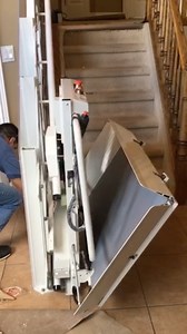 An inclined platform lift travels over the stairs along a rail installed on the support wall. It's ideal for wheelchair users because you simply roll on and off the lift. Safety arms and ramp edges automatically deploy for use, and the platform folds up when not in use. You need enough room at the top and bottom landing for the platform. But this solution means you do not have transfer from the wheelchair to a stairlift - eliminating the transfer danger – and you don't need a mobility device for
