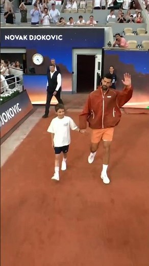 Novak Djokovic walks out onto Court Philippe-Chatrier as he begins his quest for Grand Slam No. 25 👏