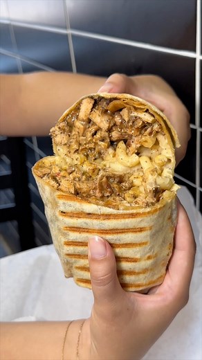The JERK CHICKEN MAC & CHEESE WRAP from Chicky’s NYC in Queens!! 🍗🔥🧀🌯🤤 Don’t mind if we do! #DEVOURPOWER | DevourPower