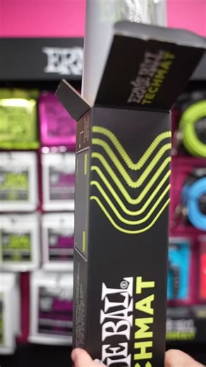 String up, repair, and polish your instrument with the all-new Ernie Ball TechMat available everywhere this Summer! Made from a durable non-slip rubber base with soft padding, the tech mat’s slip-resistant smooth fabric surface protects your instrument from hard surfaces. The extra-large format accommodates most guitars and basses and features a metric and Imperial ruler for a quick reference guide. #namm2023 #nammshow | Ernie Ball