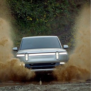 Michigan startup Rivian has unveiled a pricey all-electric truck that the company says can tow and off-road as well as a traditional pickup. https://cnn.it/2RDKQjG | CNN Business