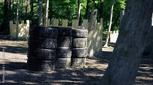 in the wild on pinball court there is a homemade wall made of wheels under the car to protect the player from falling