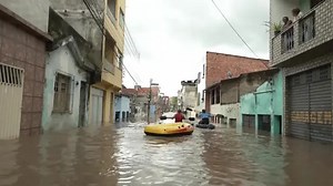 Dams burst in Brazil as region hit by floods