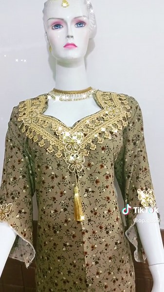 Elegant Floral Dress on a Headless Mannequin Display