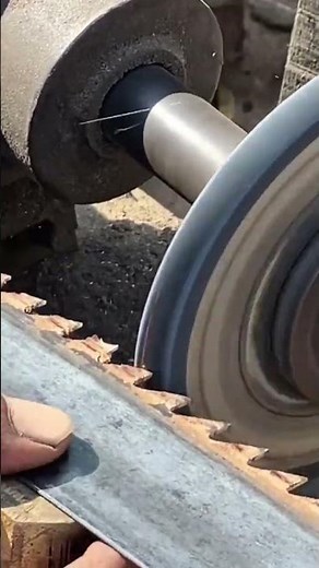 the process of sharpening a saw tooth using a simple tool