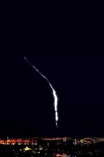 Spectacular Nighttime Fireworks Over City Skyline