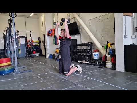 How to do the Kneeling Dumbbell Press