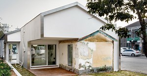 layered house incorporates an old blue roof house in korea, by starsis