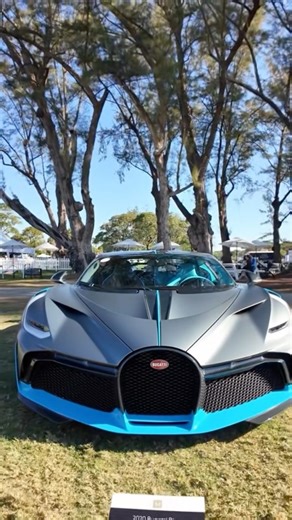 One of only 40 in existence. The Bugatti Divo stuns with every sculpted line and every whisper of quad-turbo power. Seen here at MODA Miami. #BugattiDivo #Divo #Bugatti | Kurt Harfmann Supercars