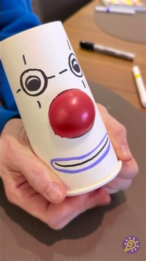 Juguete de Payaso Divertido con una Taza y un Globo 🤡