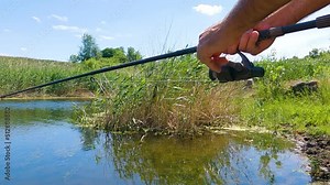 The process of winding fishing line on a spinning