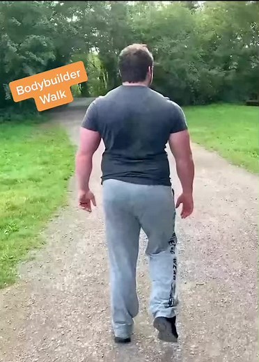 Muscular Twink Walking Outdoors