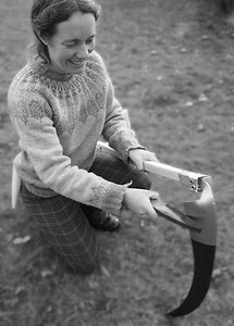 Sharpening a scythe with a stone (honing) - Scythe Cymru