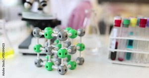 Scientist is working in background of molecule test tube. Dna and chemical elements research concept Stock Video