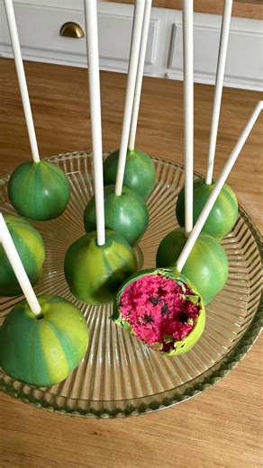 Sheri Wilson on Instagram: "Watermelon Cake Pops 🩷💚 These cake pops are so yummy and perfect for summer gatherings! You’ll only need 4 ingredients to make them! Ingredients: 1 box strawberry cake mix, prepped and baked 1/4 cup strawberry frosting 1/2 cup mini chocolate chips Green candy coating (2 shades), melted 1. Crumble the baked cake into fine crumbs using a large whisk. Add the frosting and mini chocolate chips, then mix until well combined. 2. Scoop out small amounts of the batter and r