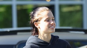 Shiloh Jolie debuts edgy brunette look with high bun and lip ring after surprise music video appearance