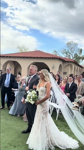 Groom surprises his bride with their dog being a part of their wedding!