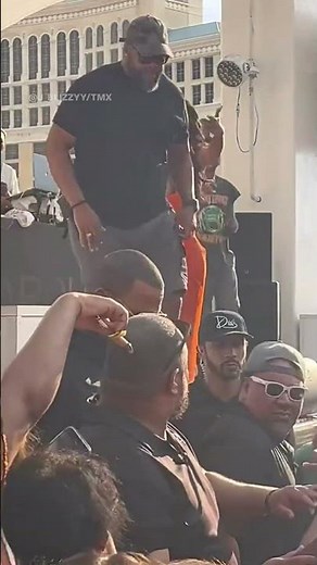 Cardi B sends mic flying towards crowd after splashed with drink