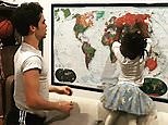 Cameron Boyce enjoys family time by playing with his little cousin