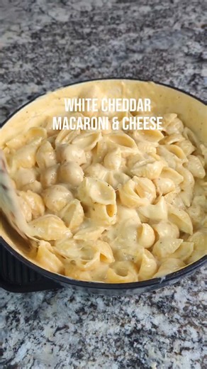 White Cheddar Macaroni and Cheese.... Shells are superior 😁 Xoxo...Alex 😘 Good-Good Baby Ingredients 1 lb. Shell noodles ½ stick Unsalted Butter ¼ c. Flour 2 c. Whole milk room temperature 1 Egg Yolk room temperature 2 tsp. Kosher salt ½ tbsp. Ground mustard 1 tsp. Paprika 1 tsp. Black pepper 2 c. White Cheddar Cheese shredded 2 c. Gruyere cheese shredded ½ c. Mozzarella cheese shredded ½ c. Reserve pasta water Start by cooking your noodles. Make sure that you salt the water. Once they are don
