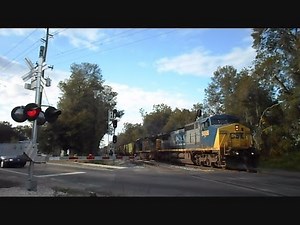 CSX Train Goes Through Signal Switches And Crossing