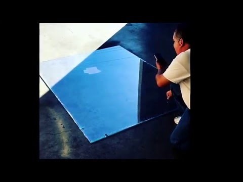 Tempered Glass Exploding in Slow Motion