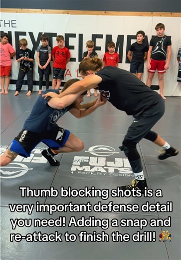 Mastering Thumb Blocking for Effective Defense in Wrestling