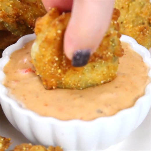 *Recipe Link in Comments* This Fried Pickles Recipe brings crispy golden bites and a zesty Creole dipping sauce perfect for game day. | Melissa's Southern Style Kitchen