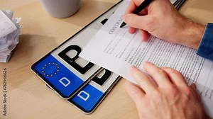 Car Registration Plate And Vehicle Document Paperwork