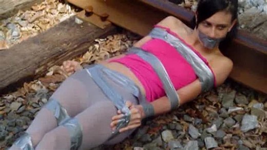 Amber tied to the tracks AVI
