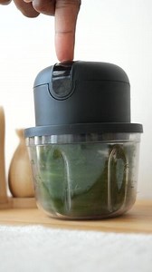 using a food processor on a table
