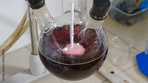 Chemical factory with laboratory. Formalin production testing. liquids being mixed in transparent bowl. Manufacture drugs for medical supplies of pharmacy industry. Pharmacology specialist at work. 4
