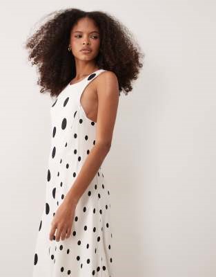 ASOS DESIGN racer maxi dress with asymmetric hem in mixed black spot | ASOS