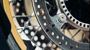 Explore the Motorcycle Disc Brake and Spokes in Slow Motion for a detailed view of the mechanics and technology