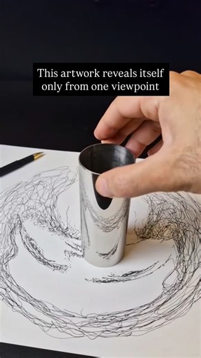 Ezoji is a visual artist recognized for his anamorphic drawings that challenge perspective and perception. At first glance, his works appear as scattered, abstract lines, but when viewed from a specific angle or through a mirror, they suddenly come together as clear, intentional images. Through carefully calculated distortion and precise spatial planning, he transforms flat surfaces into compelling optical illusions. His art encourages viewers to pause, adjust their viewpoint, and experience the