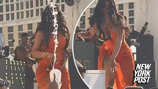 Cardi B throws microphone at concertgoer who tossed drink at her onstage