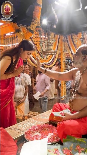 Bigg Boss winner Anumol receiving divine blessings from Unni Swami at Devasthanam Temple 🙏