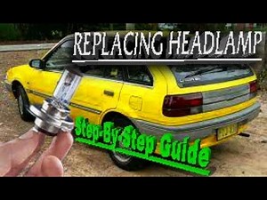 Car Headlight Replacement (Quick And Easy) | Ford Laser Tracer