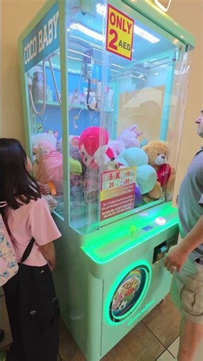 claw machine: squishmallow stuff toy