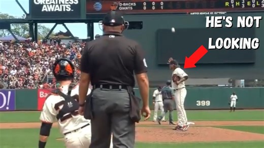 MLB catcher throws a ball perfectly into pitcher's mitt when he's not looking