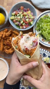 Chicken Wrap with Spicy Yogurt Sauce & Salad 🌯 Ingredients: For the chicken: 2 lb boneless chicken breast or thighs, cut into slices 4 tbsp whole milk yogurt 2 tbsp tomato paste 2 tbsp freshly squeezed lemon juice Salt to taste 1 tbsp black pepper 1 tsp red chili powder 1 tbsp garlic powder 1 tbsp Cajun seasoning 1 tbsp onion powder 3 tbsp oil For the spicy yogurt dressing: 1 cup yogurt 2 tbsp mayonnaise 3 tbsp hot sauce Salt to taste 1 tsp black pepper 1 tsp garlic powder 1 tsp onion powder 1 