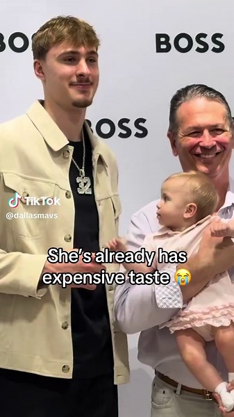 Little Girl Reaches for Cooper Flagg's Shiny Chain