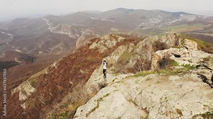 Young girl pose dancing for video in nature. Concept filmmaker couple in scenic nature alone shooting together stock footage.