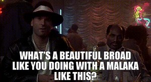 What's a beautiful broad like you doing with a malaka like this?