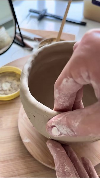 Crafting a Clay Pot by Hand with Precision and Care